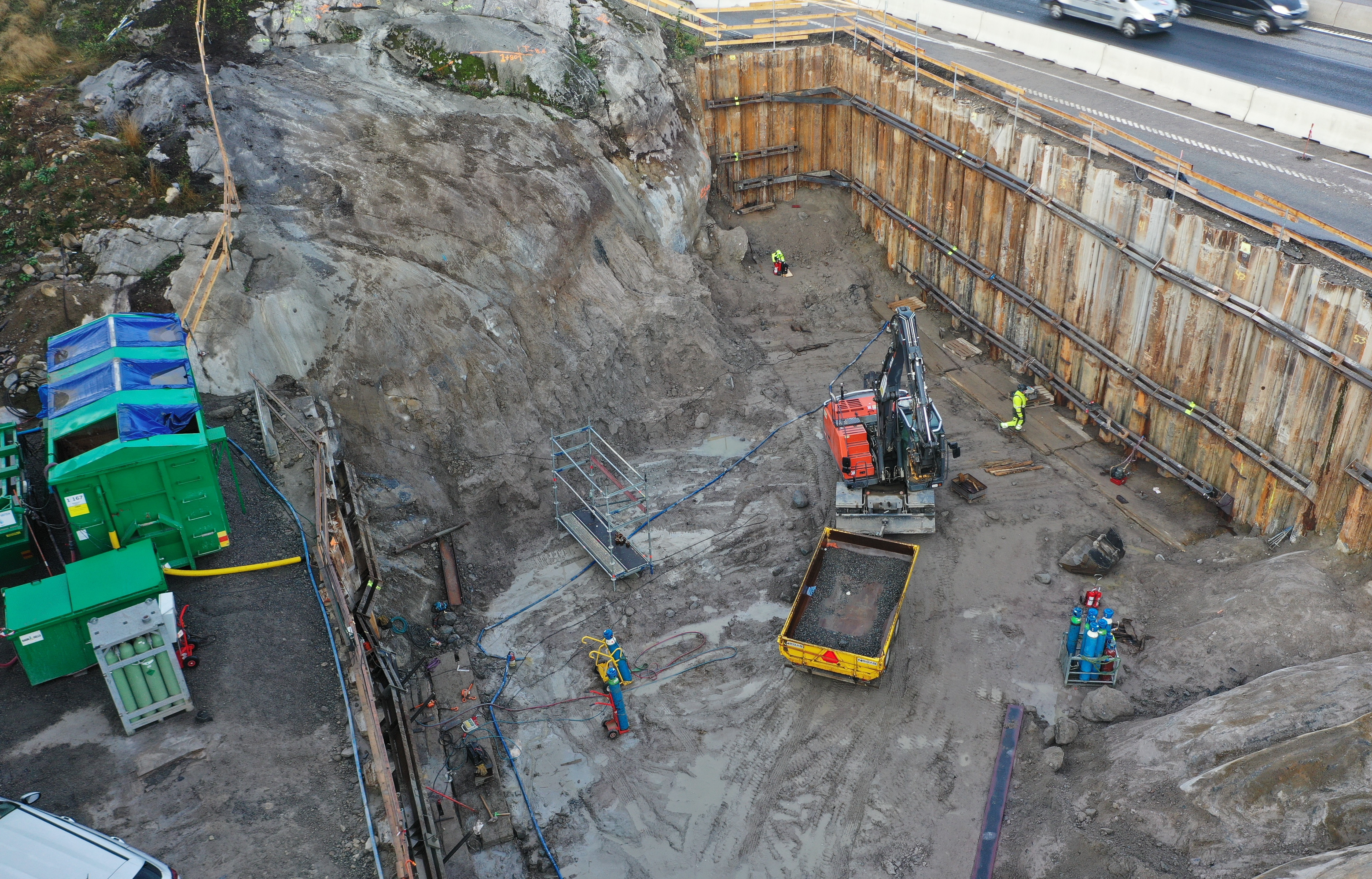 Aerial view of an excavation with retaining structures