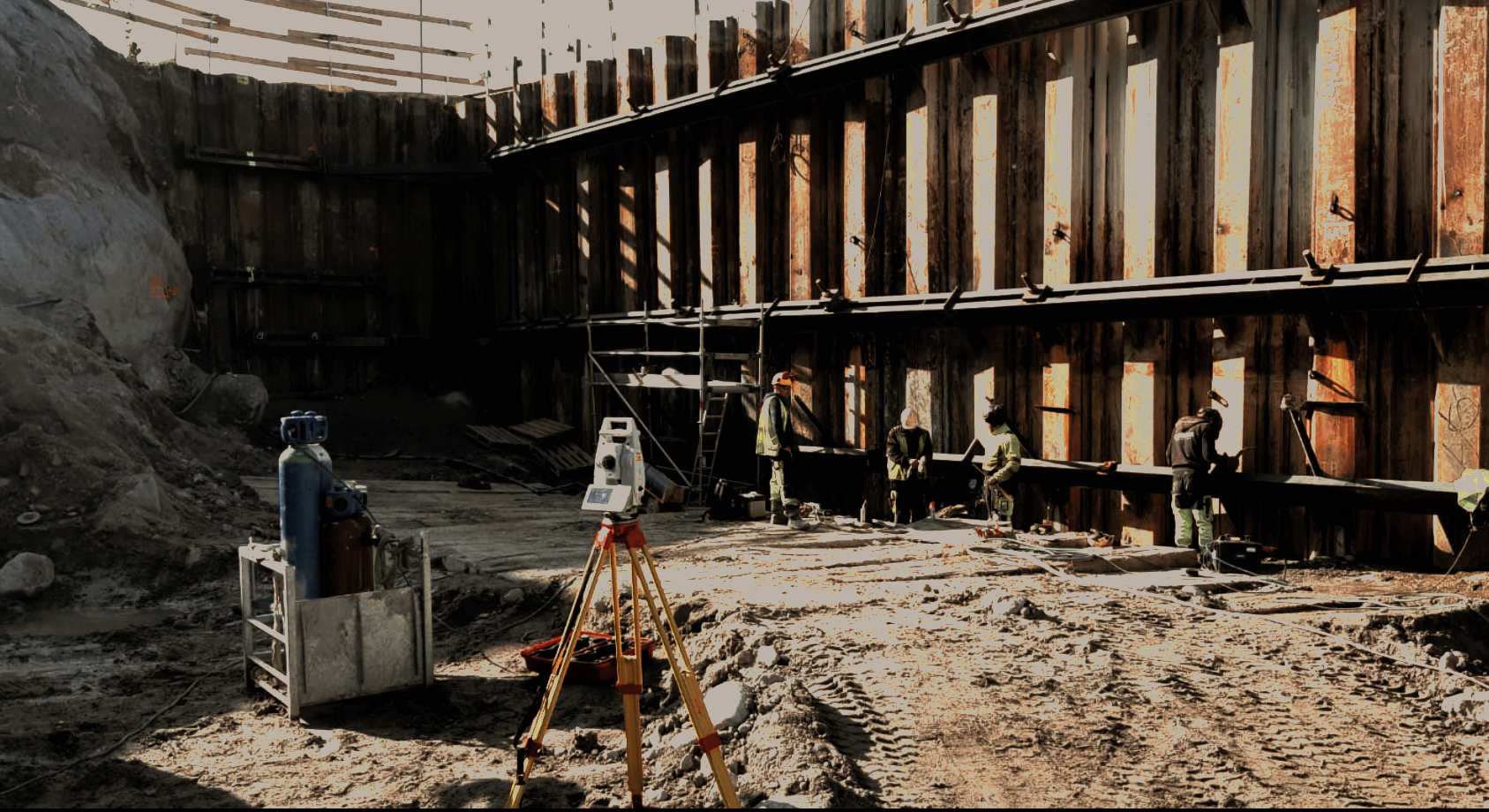 Surveying instrument set up at an excavation site