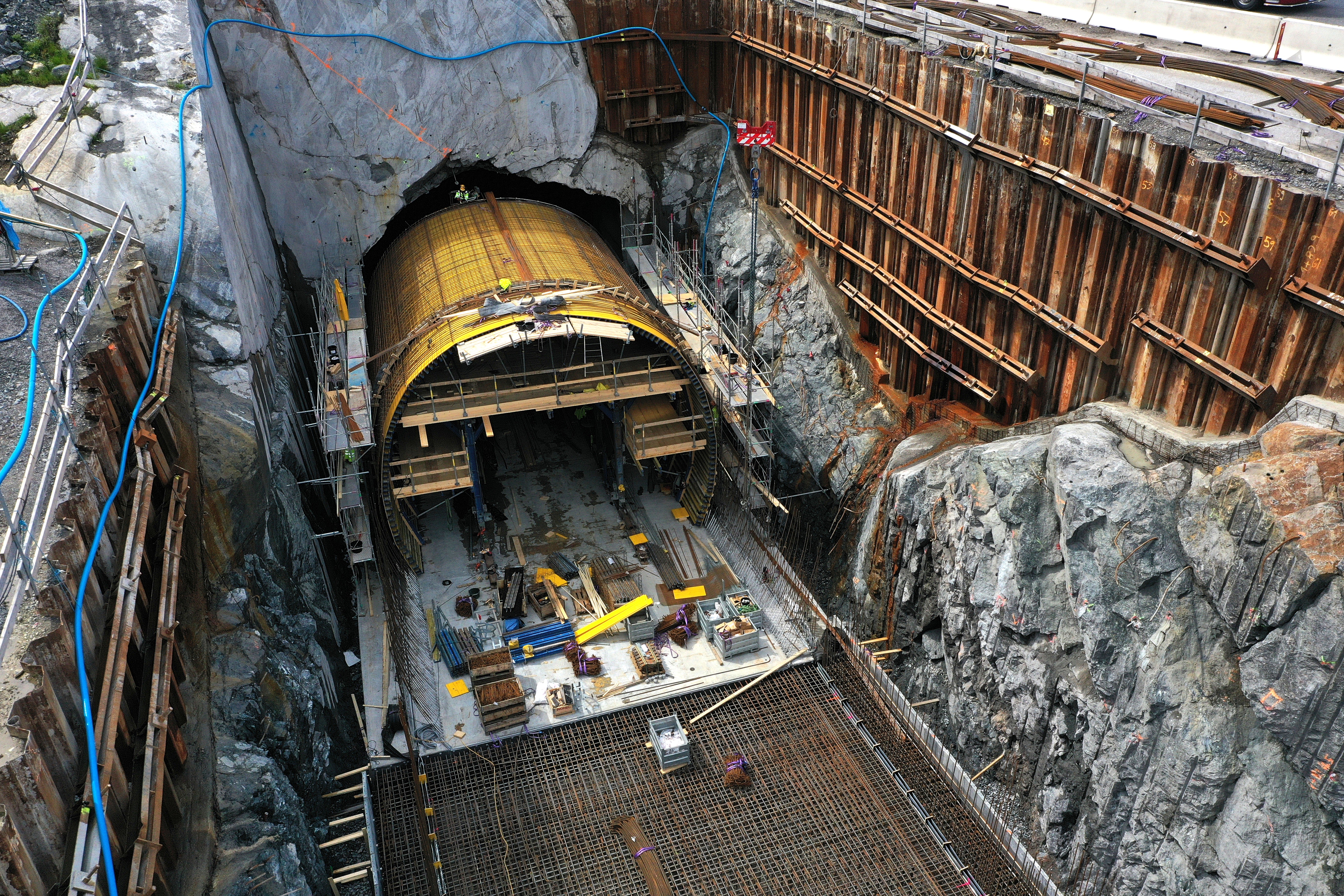 Surveyor working inside an underground tunnel