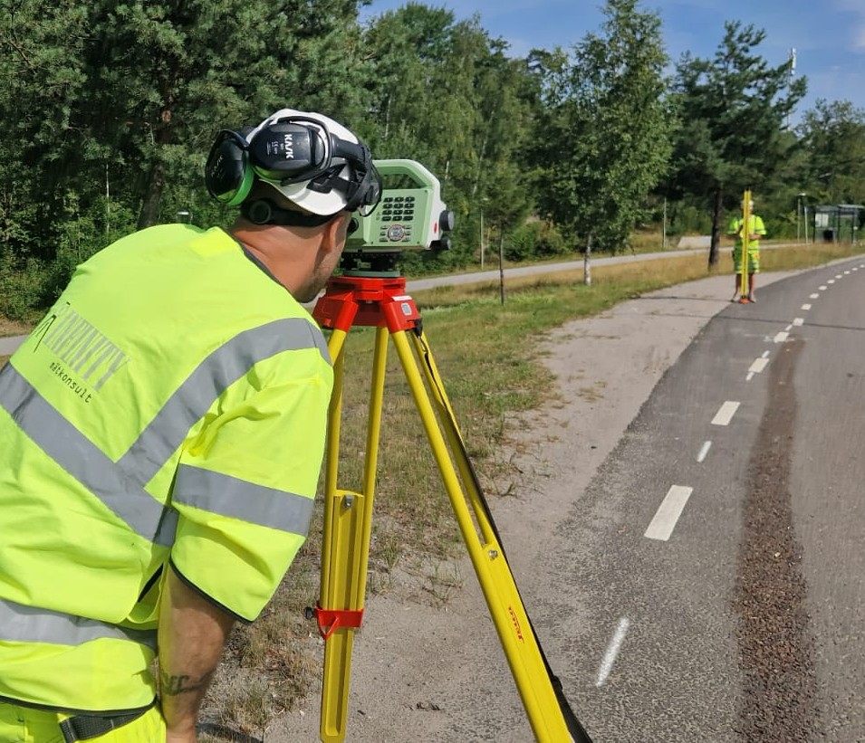 Total station set up beside a new road