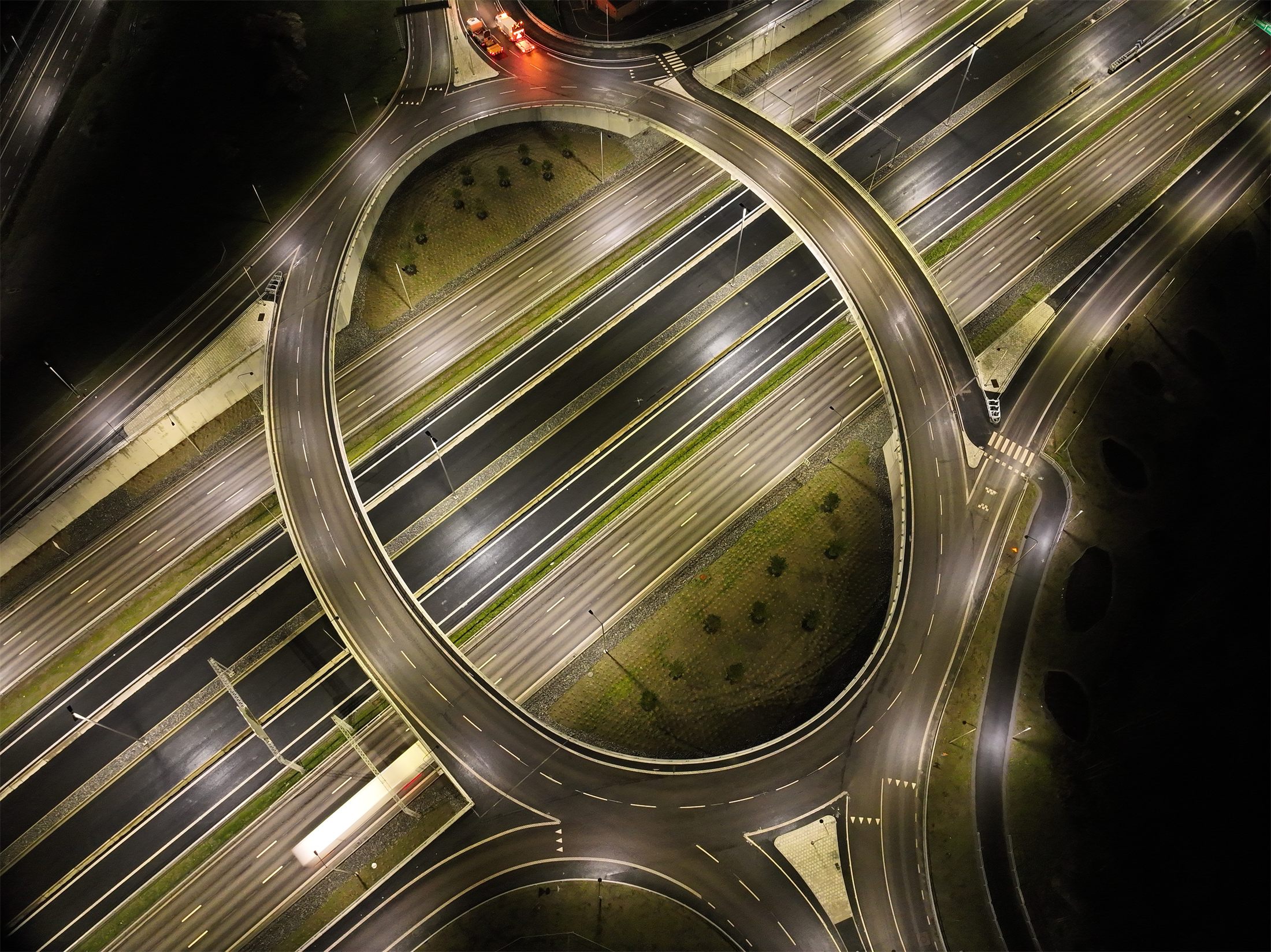 Finished roundabout and road connections in use at night