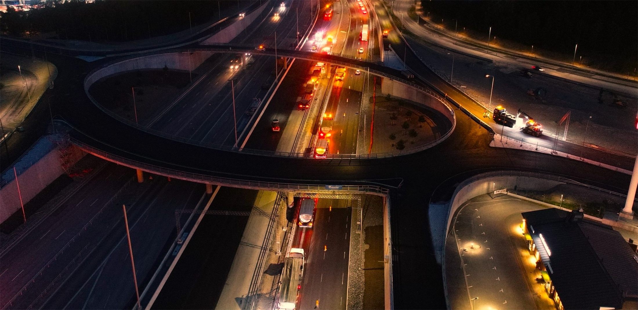 Night-time bridge works with traffic running below